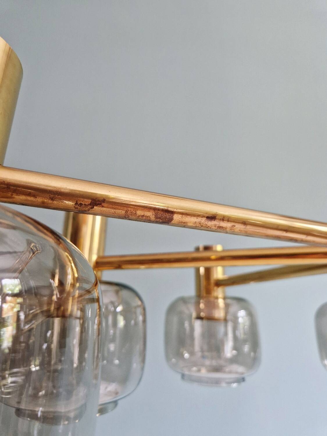 Large designer chandelier in brass and smoked glass globes, 1970s
