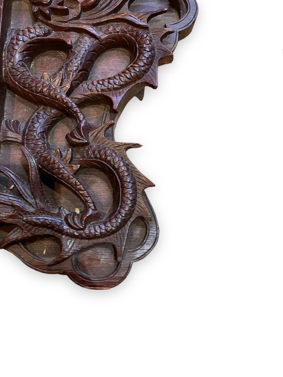 Pair of exotic wooden frames with dragons