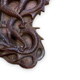 Pair of exotic wooden frames with dragons