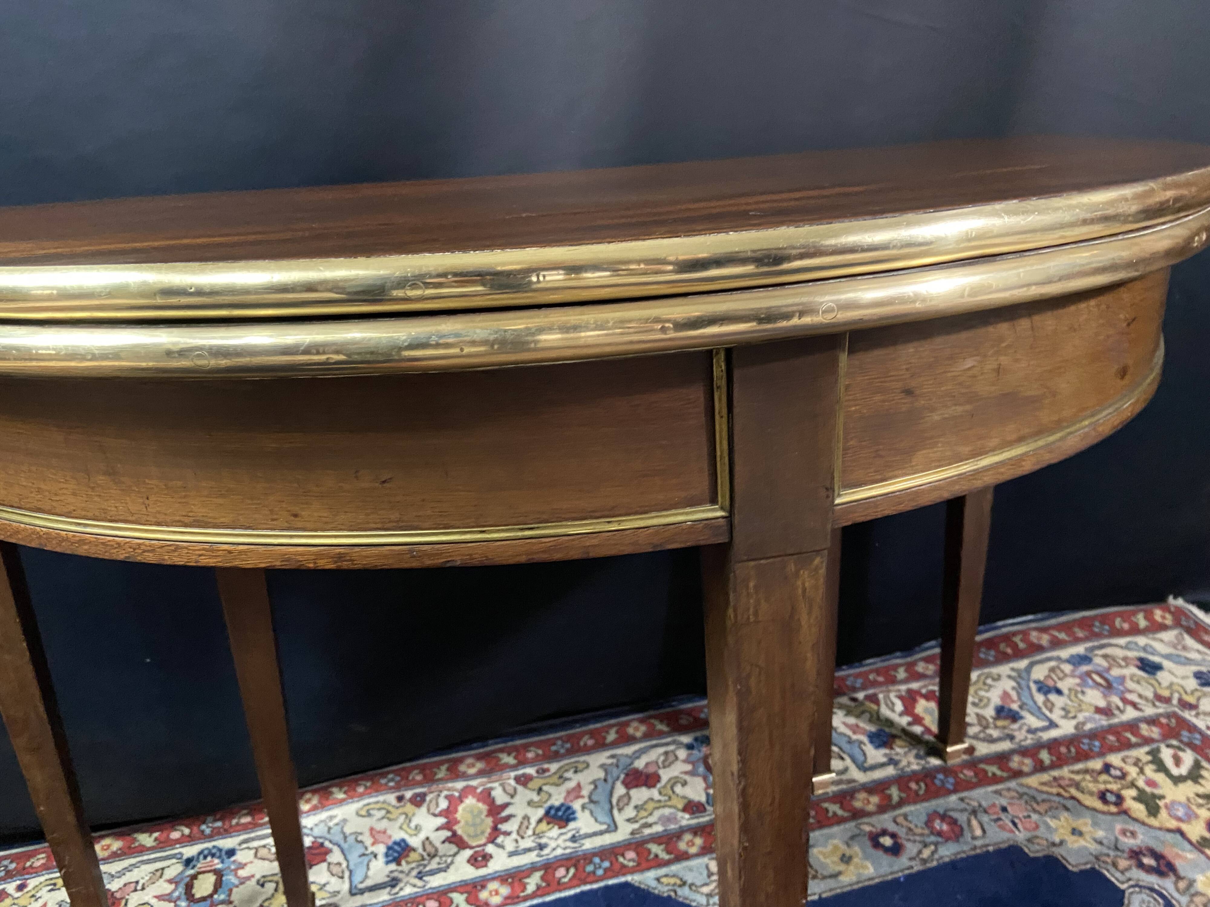 Console table demi-lune 19th century Louis XVI modular foldable top in mahogany.