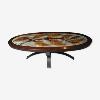 Vintage wood and ceramic elliptical coffee table by Dan Vallauris