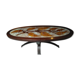 Vintage wood and ceramic elliptical coffee table by Dan Vallauris