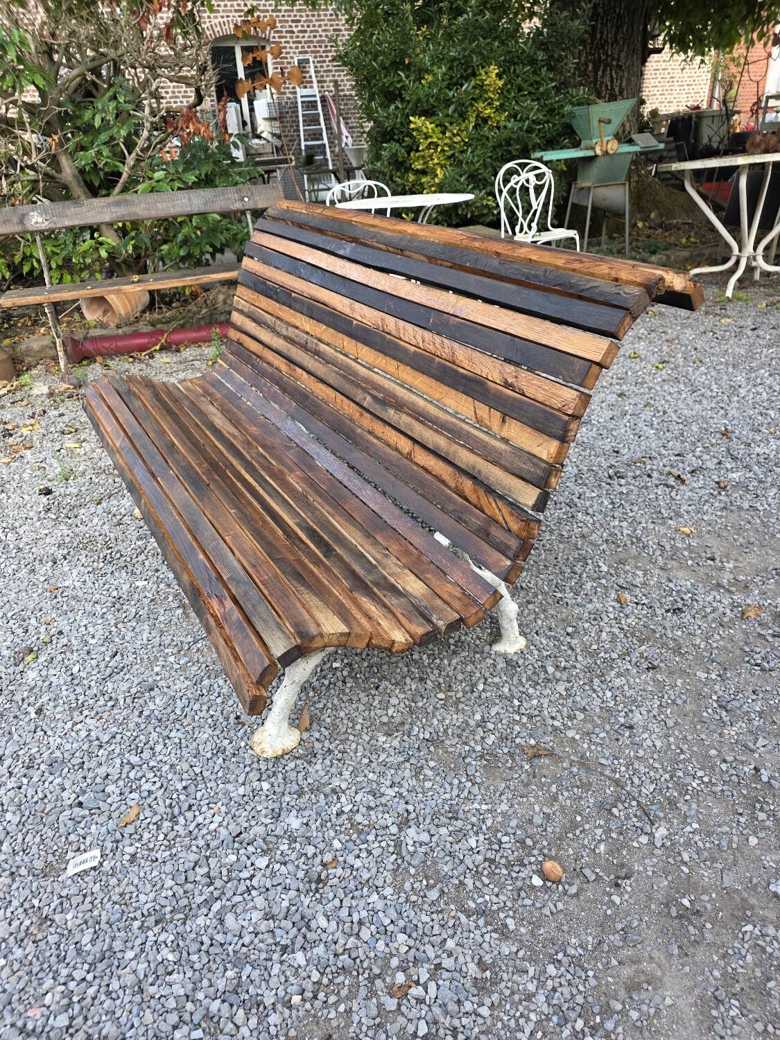 Cast iron and oak slatted garden bench