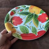 Quadrifoglio dish. Italian. Fruit and flower decoration. Shimmering colors.