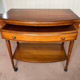 Wooden TV cabinet on casters