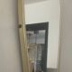 Asymmetrical free-form mirror from the 70s