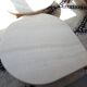 Tables gigognes en travertin Roche Bobois