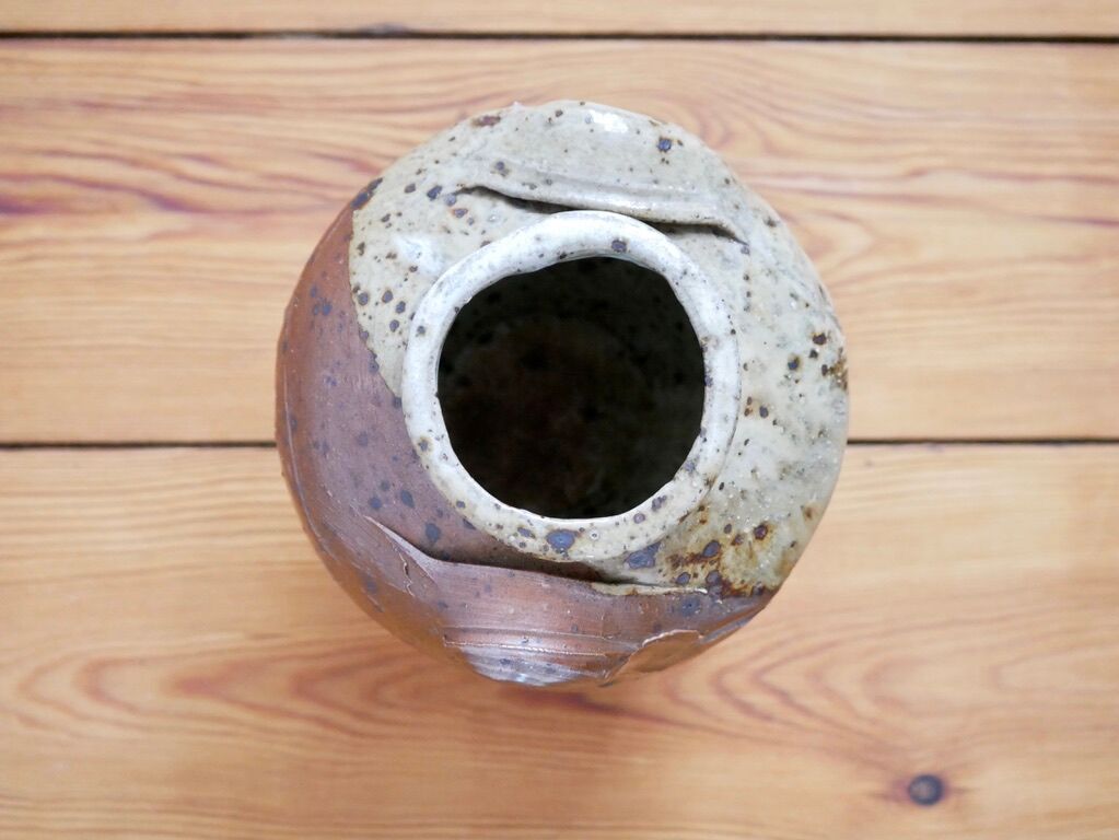 Glazed pyrite stoneware pot
