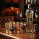 A vintage liqueur service in coloured and gold glass from the 1960s.