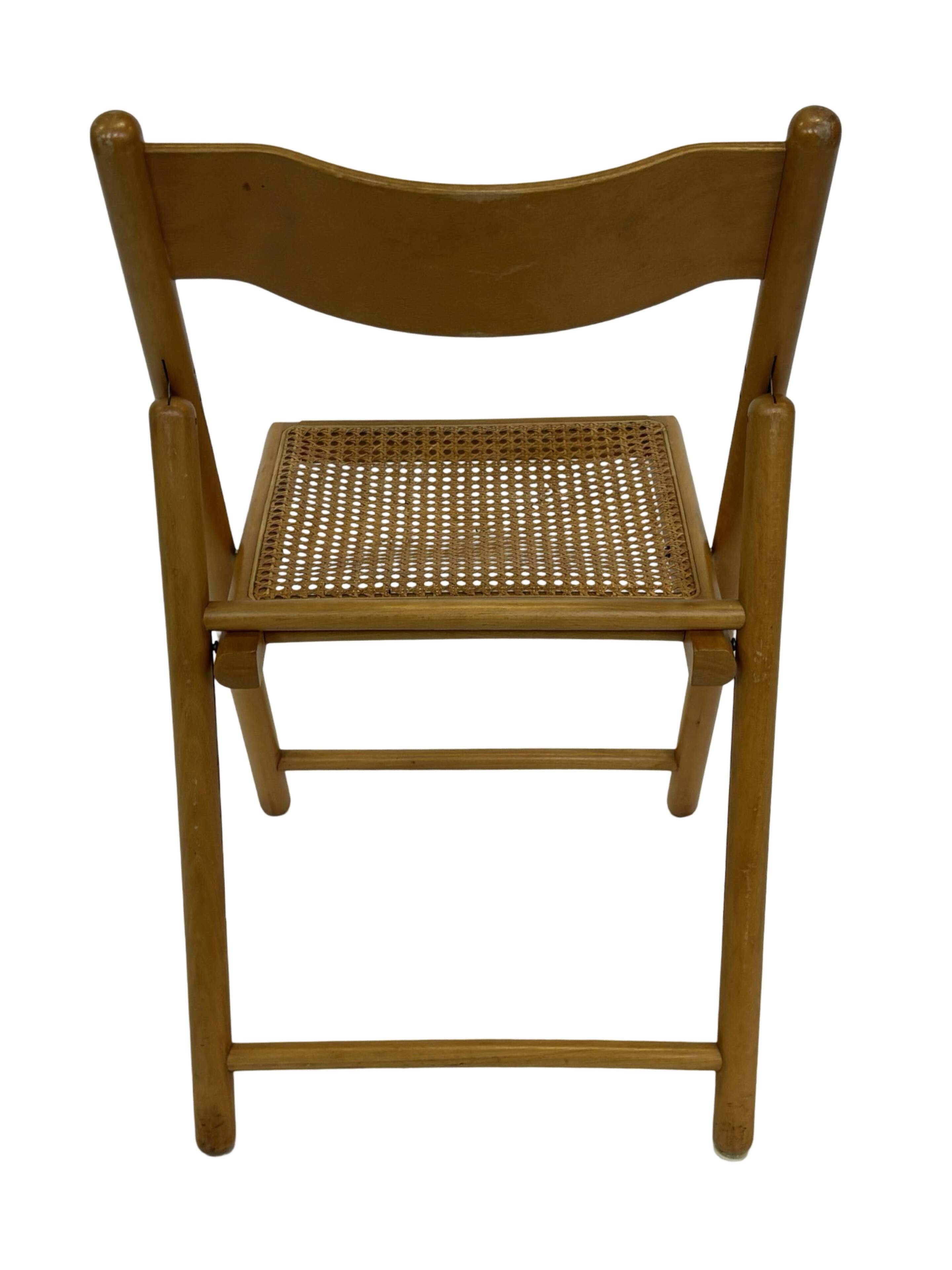Vintage wooden folding chair with rattan seat 80s minimalist design
