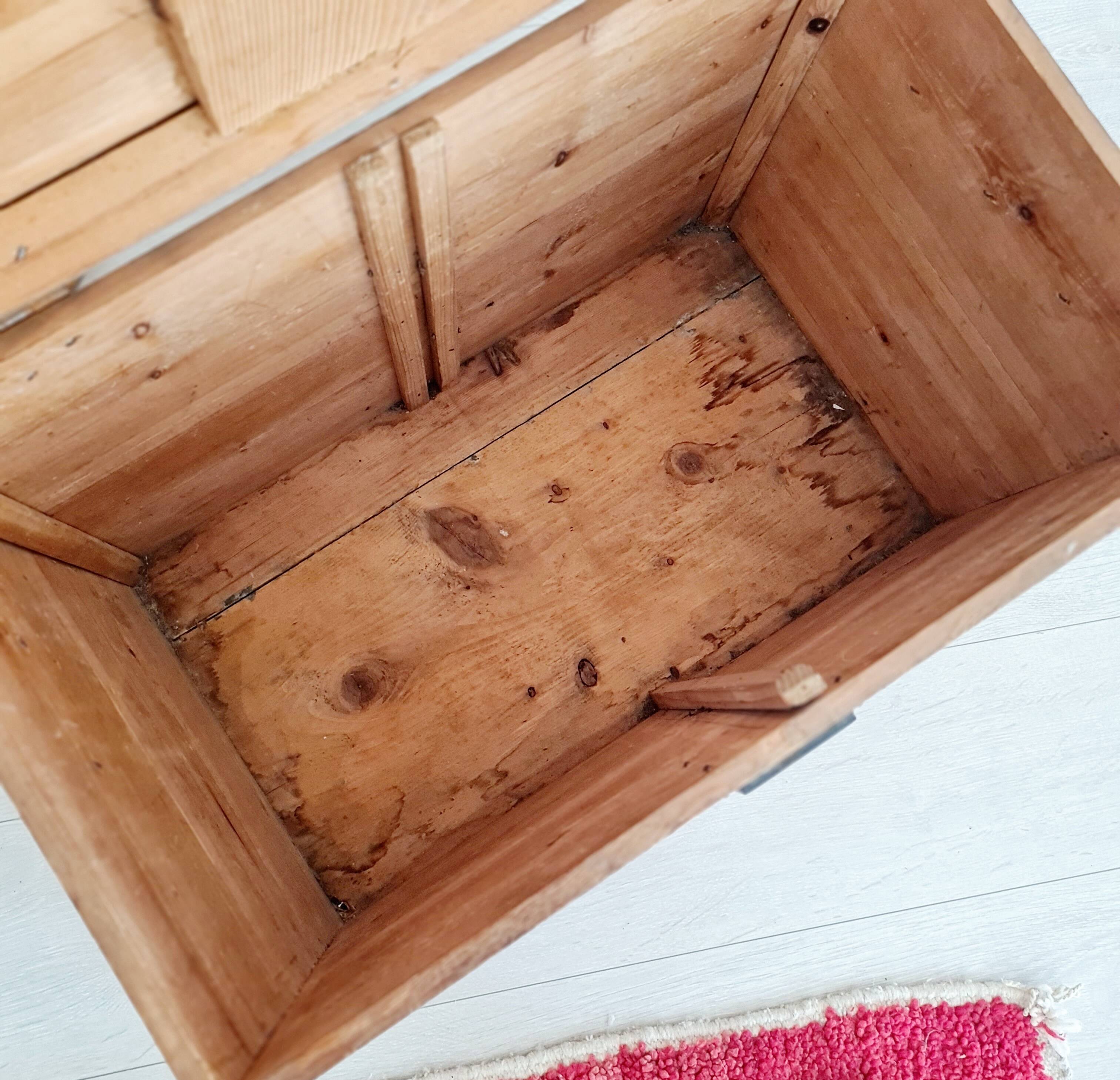 Old wooden chest with metal handles