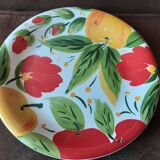 Quadrifoglio dish. Italian. Fruit and flower decoration. Shimmering colors.