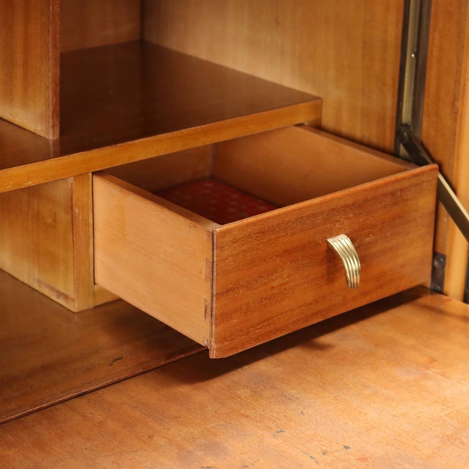 Vintage storage furniture in maple veneer with a glass top, Italian design 1950s.