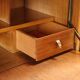 Vintage storage furniture in maple veneer with a glass top, Italian design 1950s.