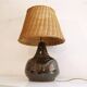 Ceramic and rattan lamp from the 20th century.
