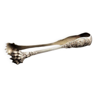 Old sugar tongs in solid silver