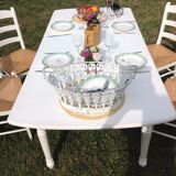 White farmhouse table set and four chairs