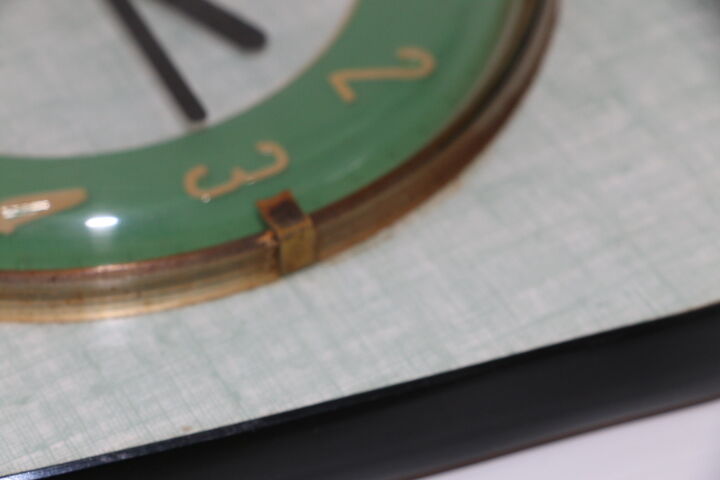 JAZ green formica wall clock