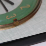 JAZ green formica wall clock