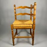 Chaise d'angle vintage en bois avec assise en paille tissée