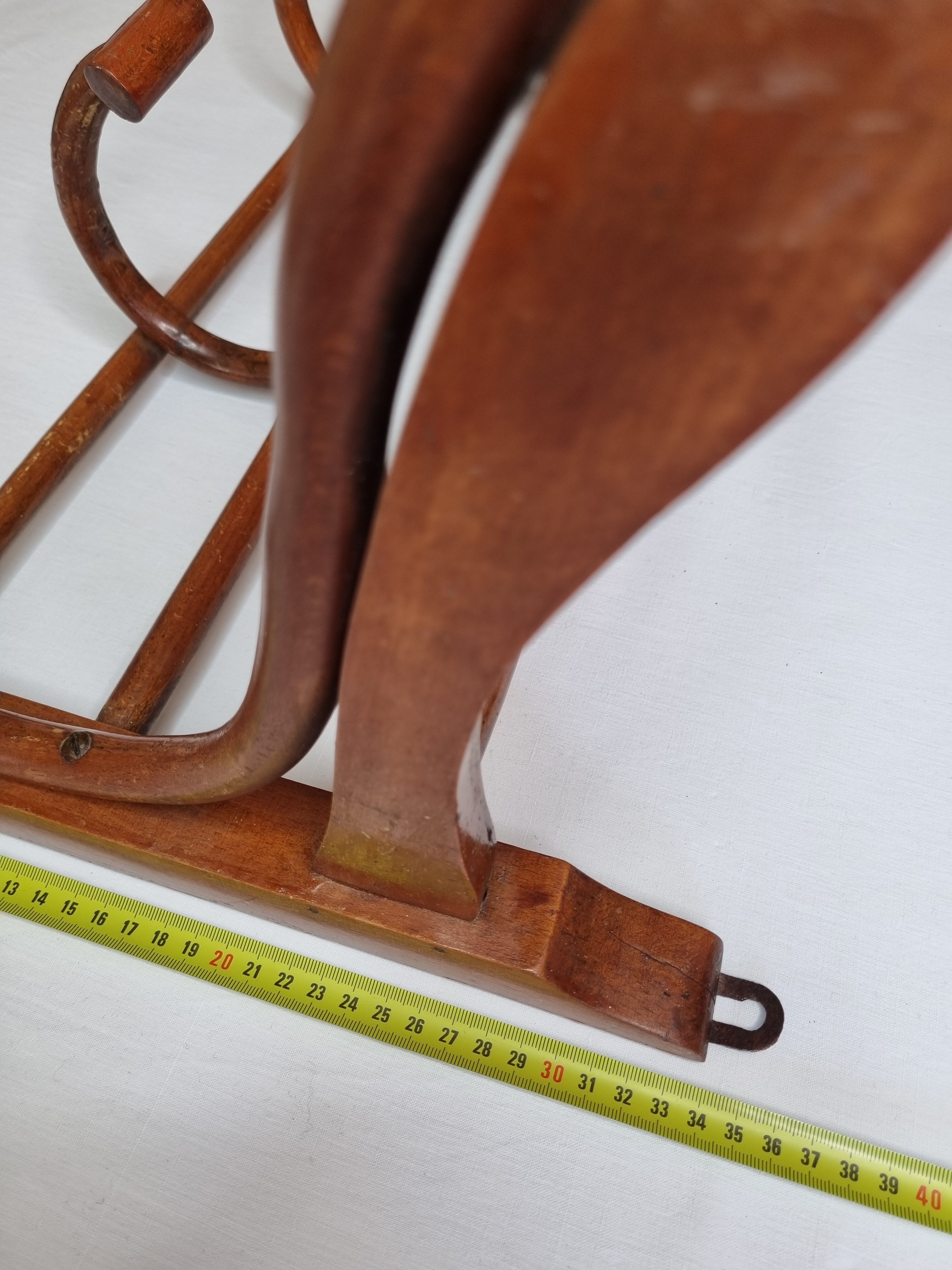 Old wall rack in curved wood, 1900s era