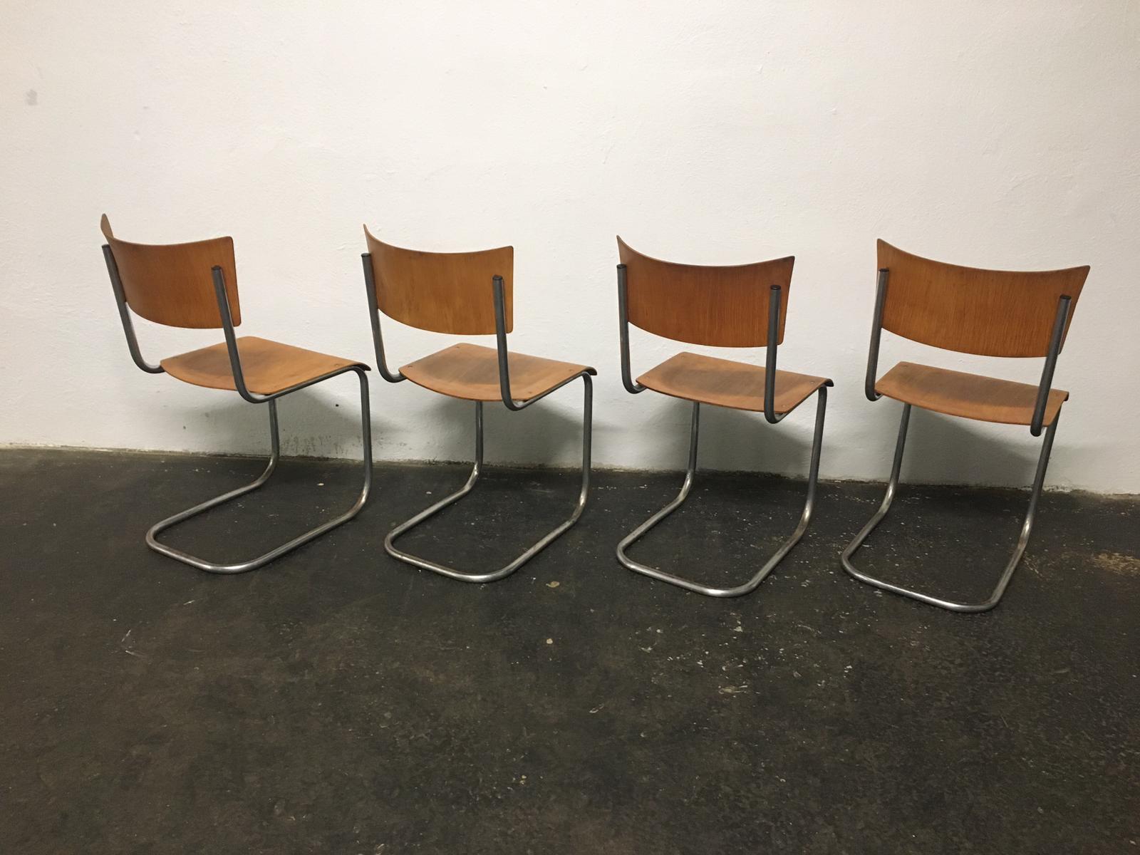 Set of 12 tubular steel chairs Mart Stam