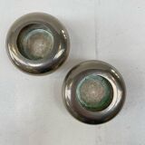 2 bougeoirs en métal argenté, années 70