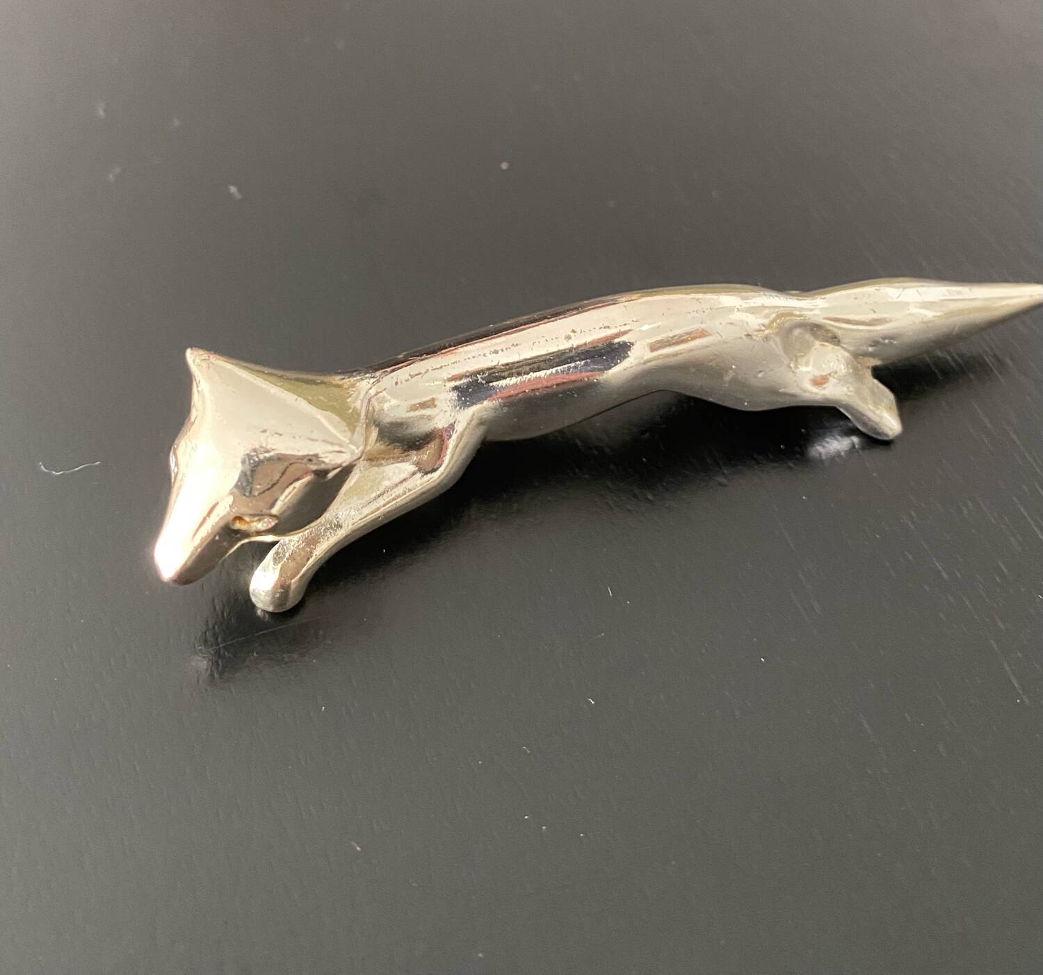 8 various animal knife holders in silver-colored metal