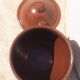 Large glazed terracotta jar, cognac colour with its lid.
