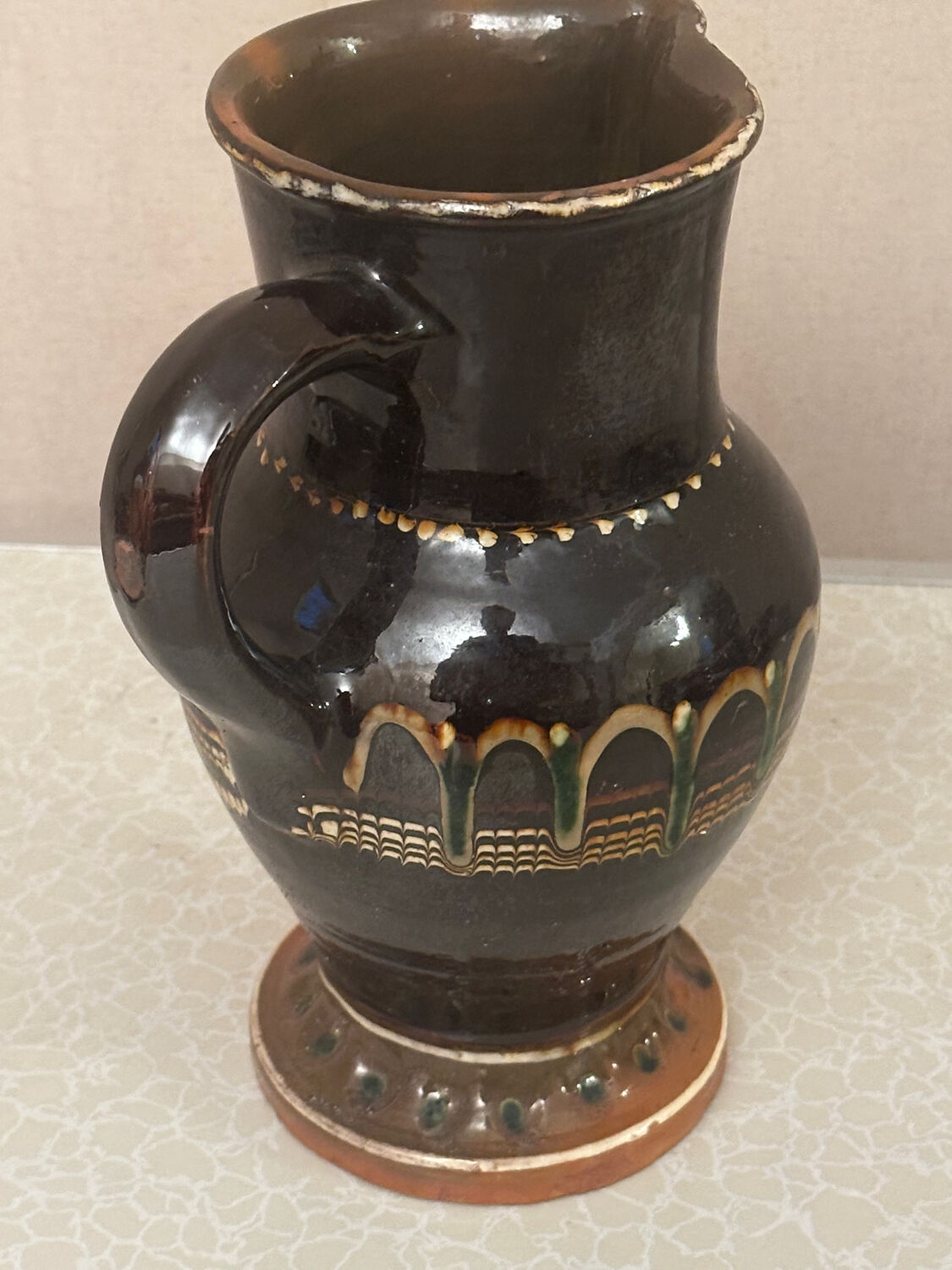 Vintage Romanian glazed pottery pitcher
