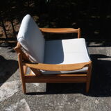 Scandinavian wooden armchair and fabric