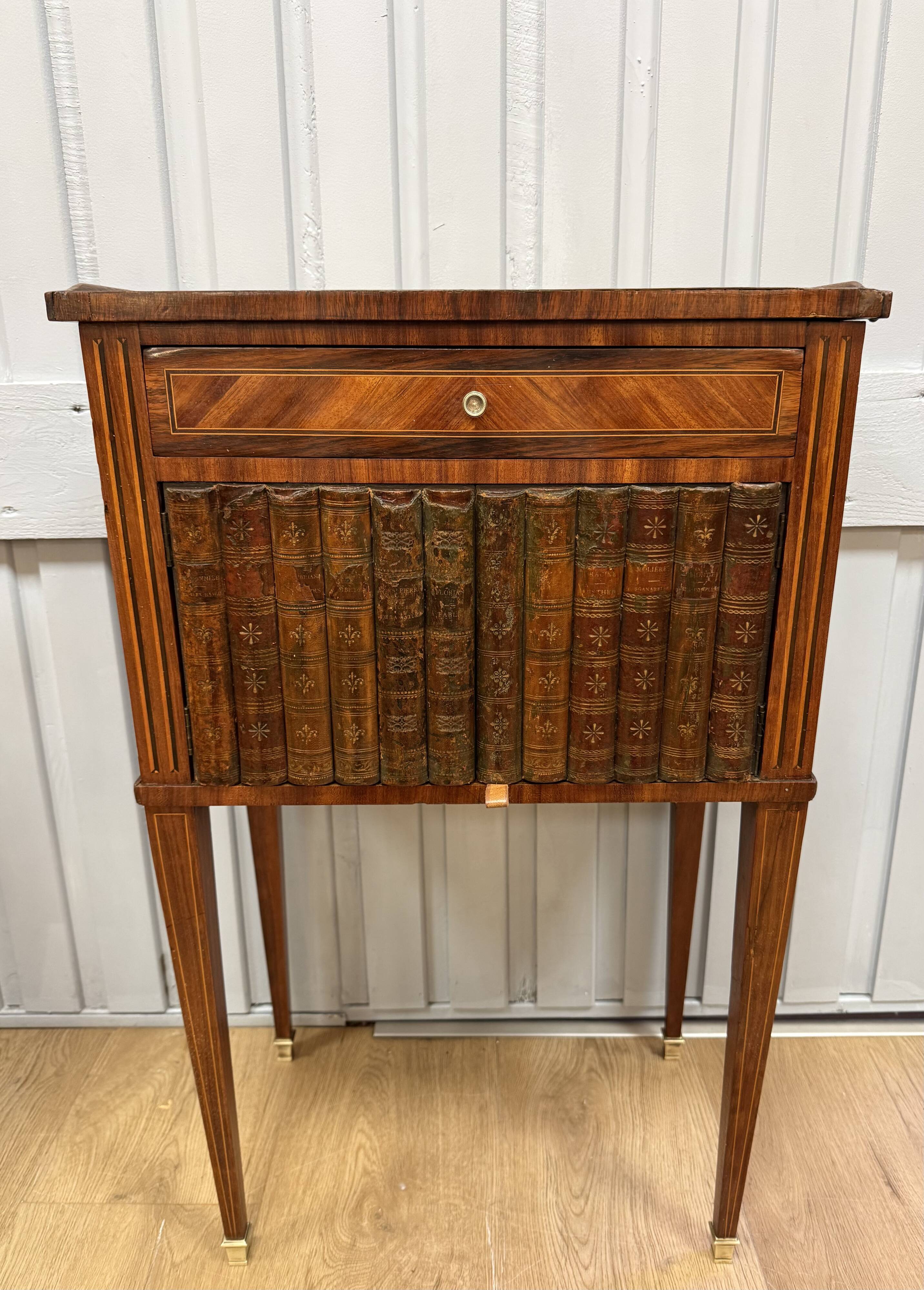 Side table with a faux book front.