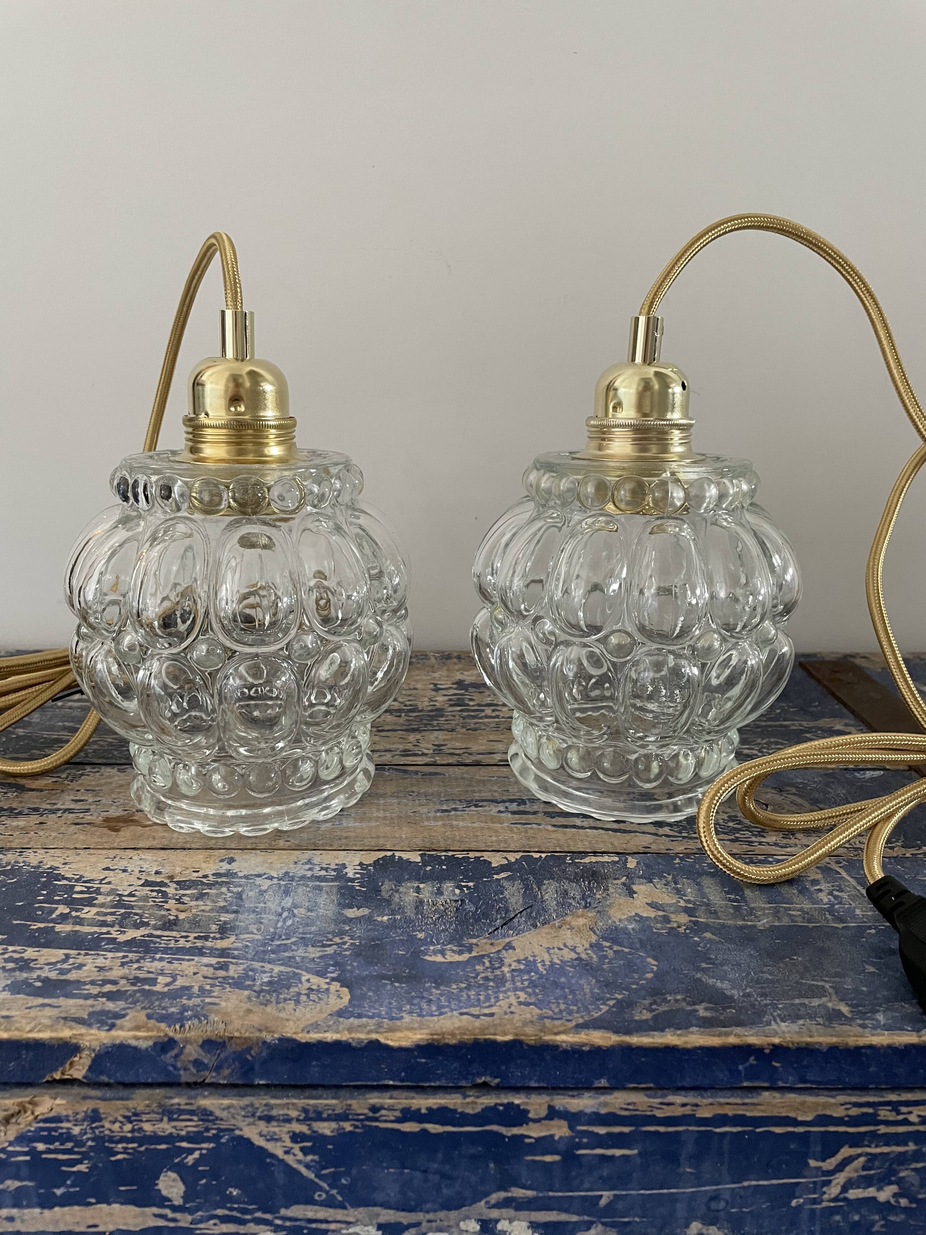 Set of two electrified chiseled glass walking lamps