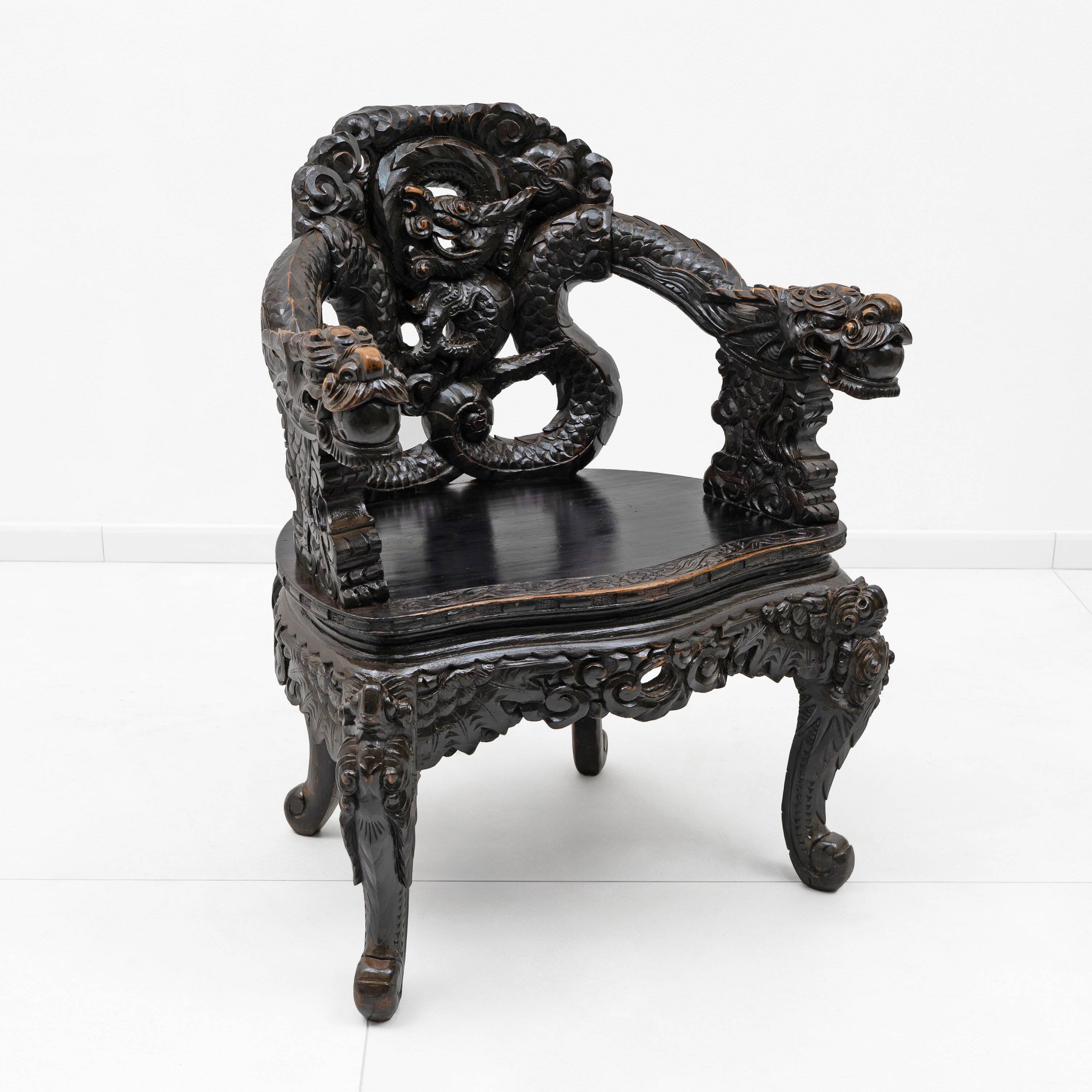 Pair of Chinese Qing Dynasty Carved Dragon Armchairs,Ebonized Hardwood,19th