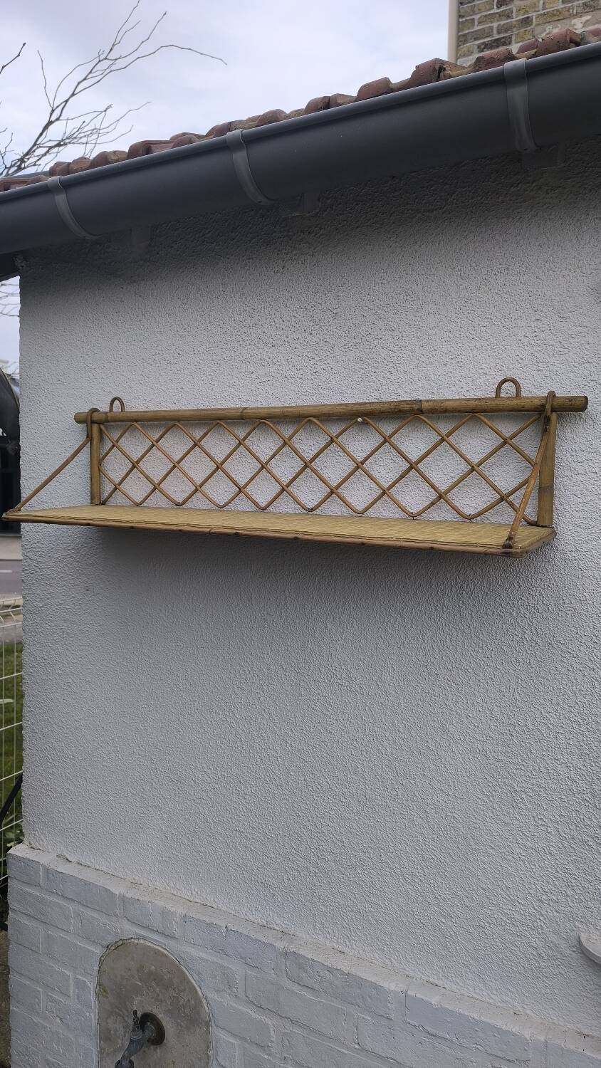 Vintage rattan wall shelf