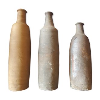 3 terracotta bottles