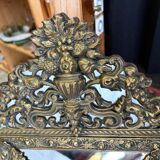 Napoleon III style mirror with gilt brass side panels