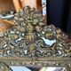 Napoleon III style mirror with gilt brass side panels