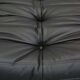 Togo armchair and footrest in black leather by Ligne Roset, designed by Michel Ducaroy.