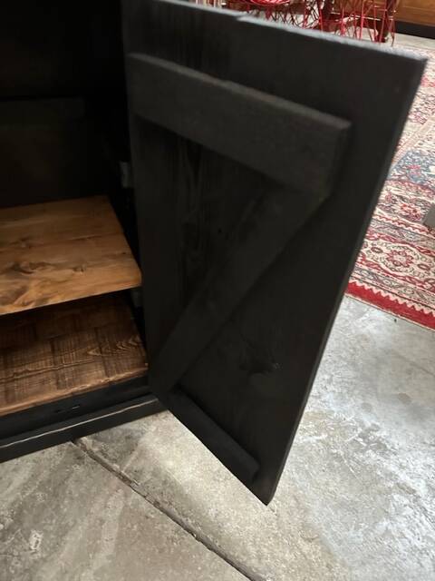 Old piece of furniture transformed into a TV stand