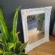 Antique mirror with painted wooden frame