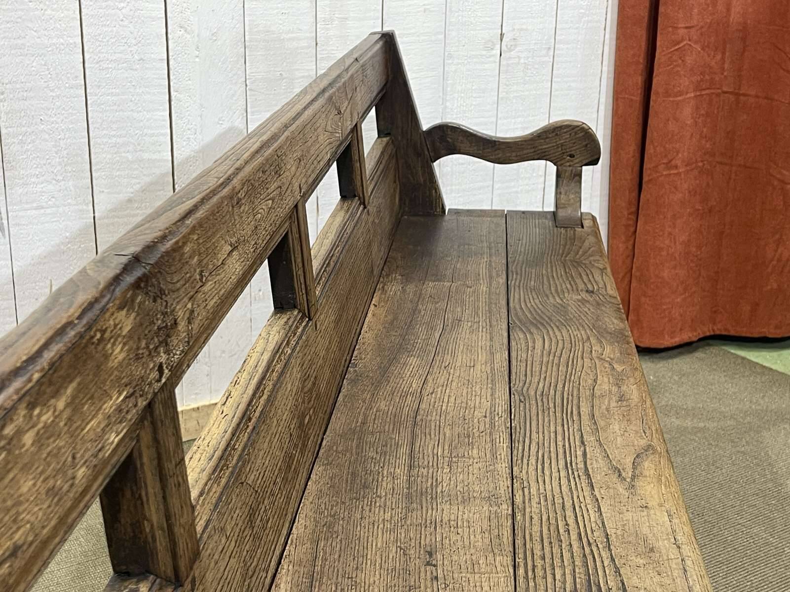 Rustic chestnut bench from the late 19th century.