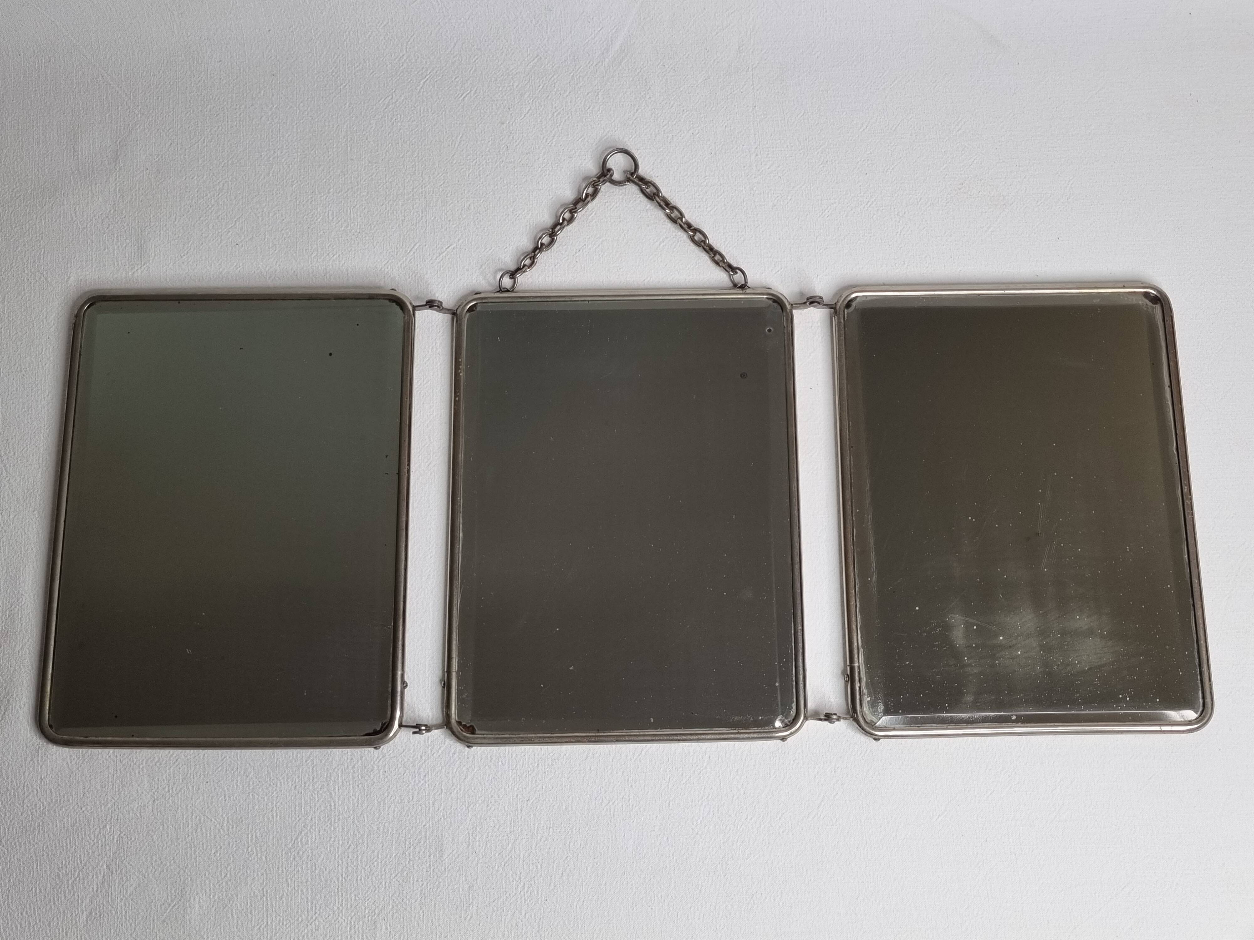 Antique triptych barber's mirror, metal frame and imitation leather back, 1930