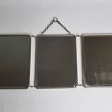 Antique triptych barber's mirror, metal frame and imitation leather back, 1930