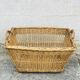 Braided wicker laundry basket