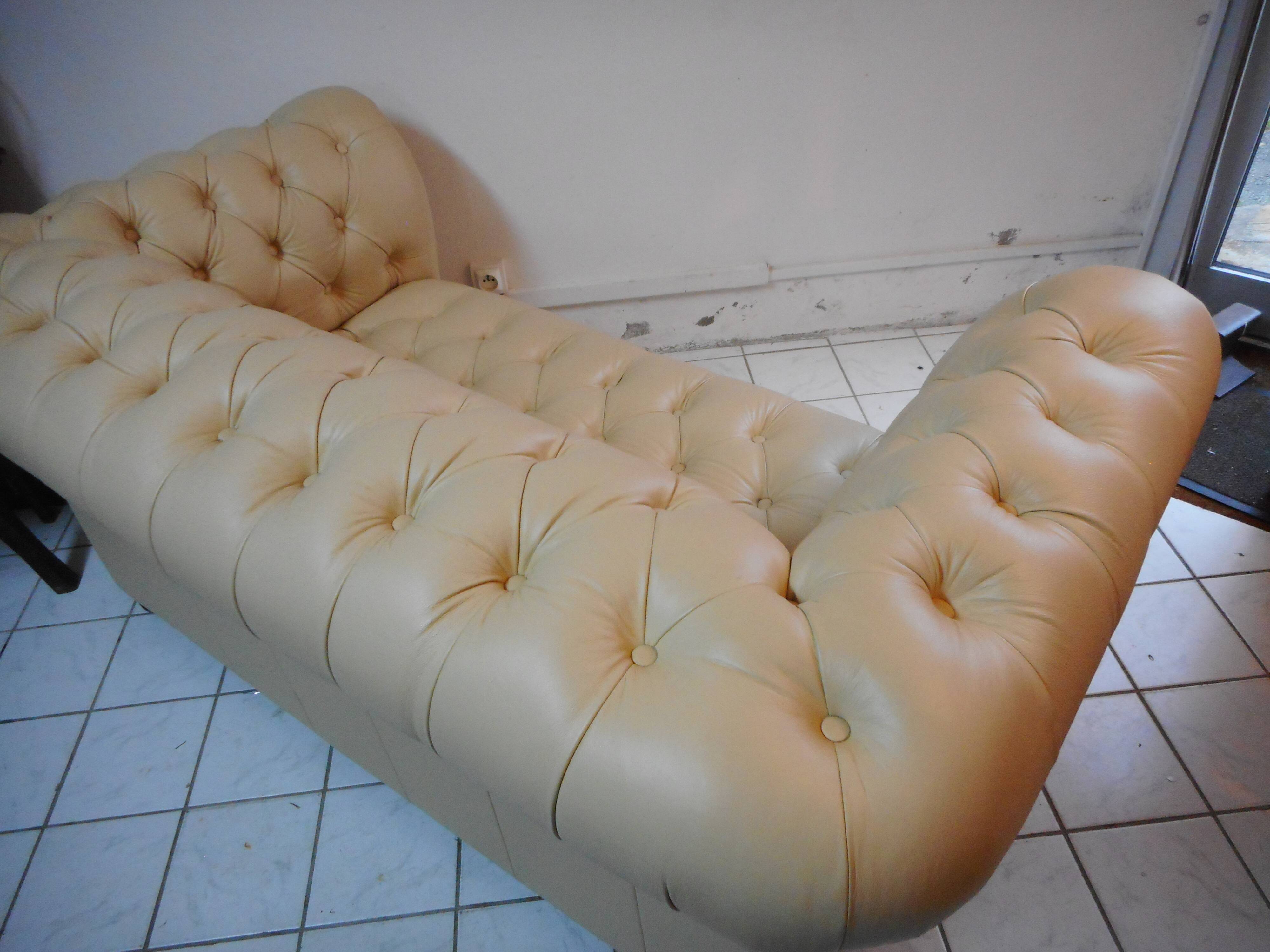 Beige leather chesterfield sofa