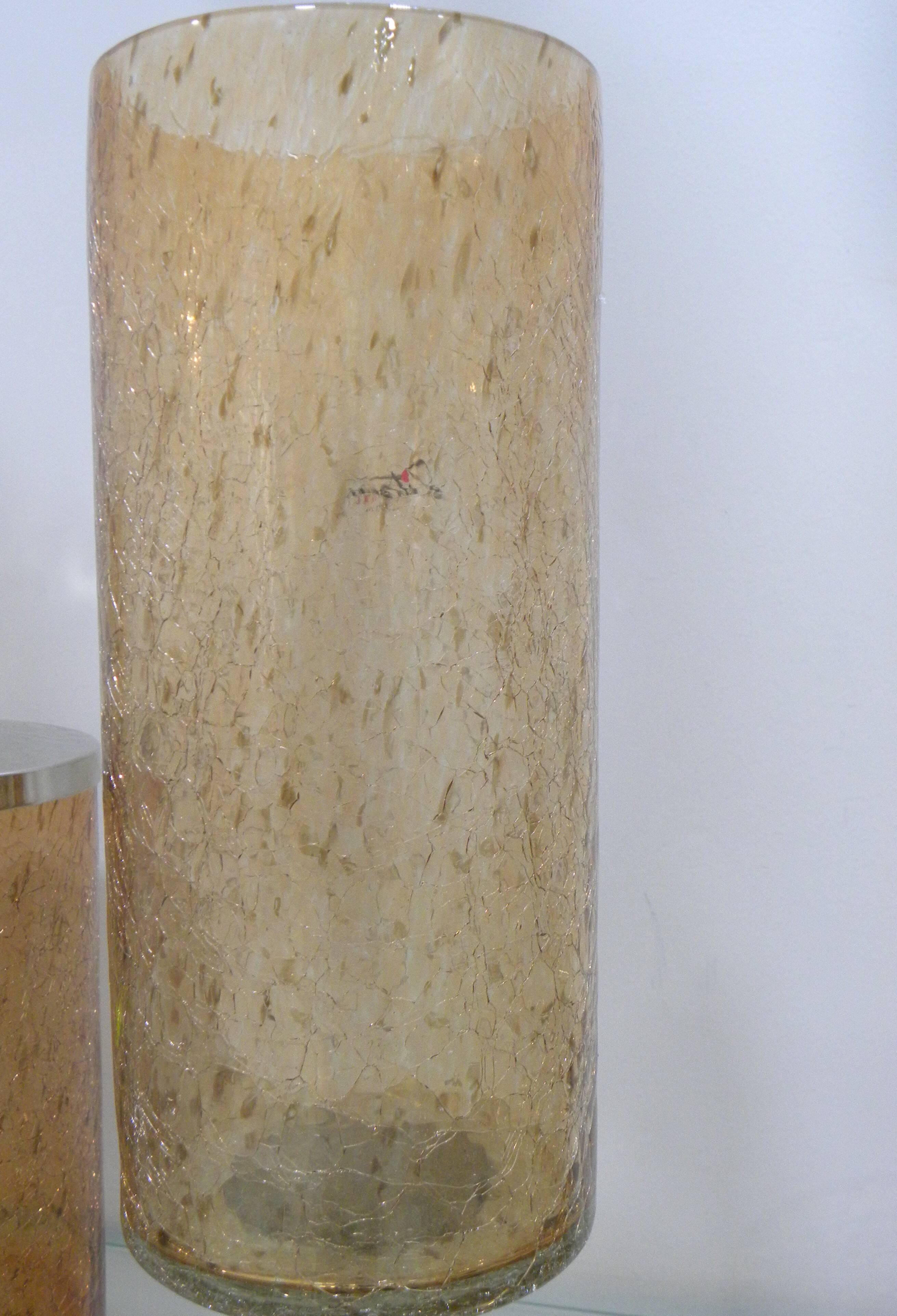 Photophore en verre craquelé ambré sur pied bougeoir en métal