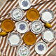 Set of twelve mismatched vintage dessert plates.