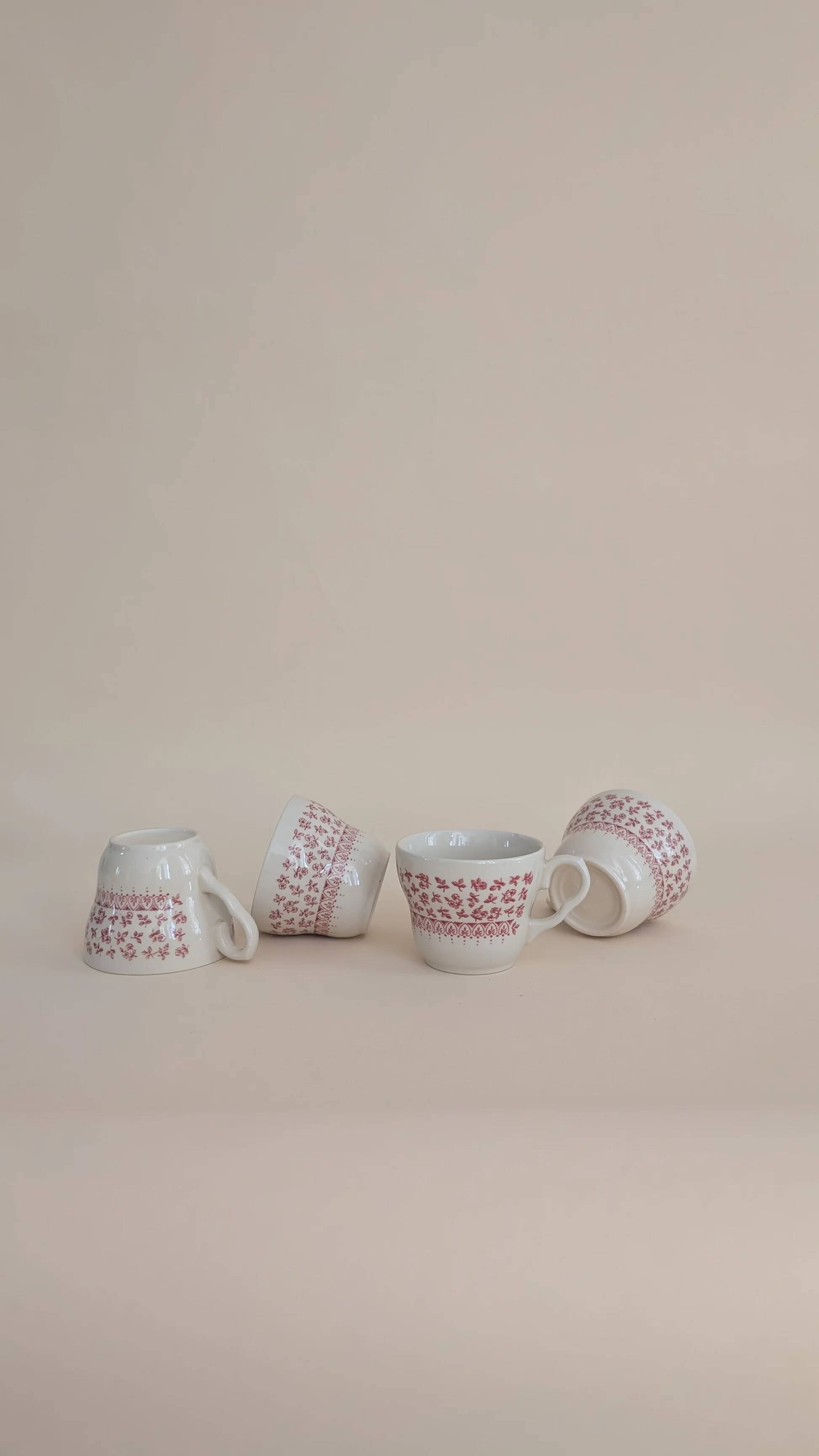 Set of 4 red ceramic mugs
