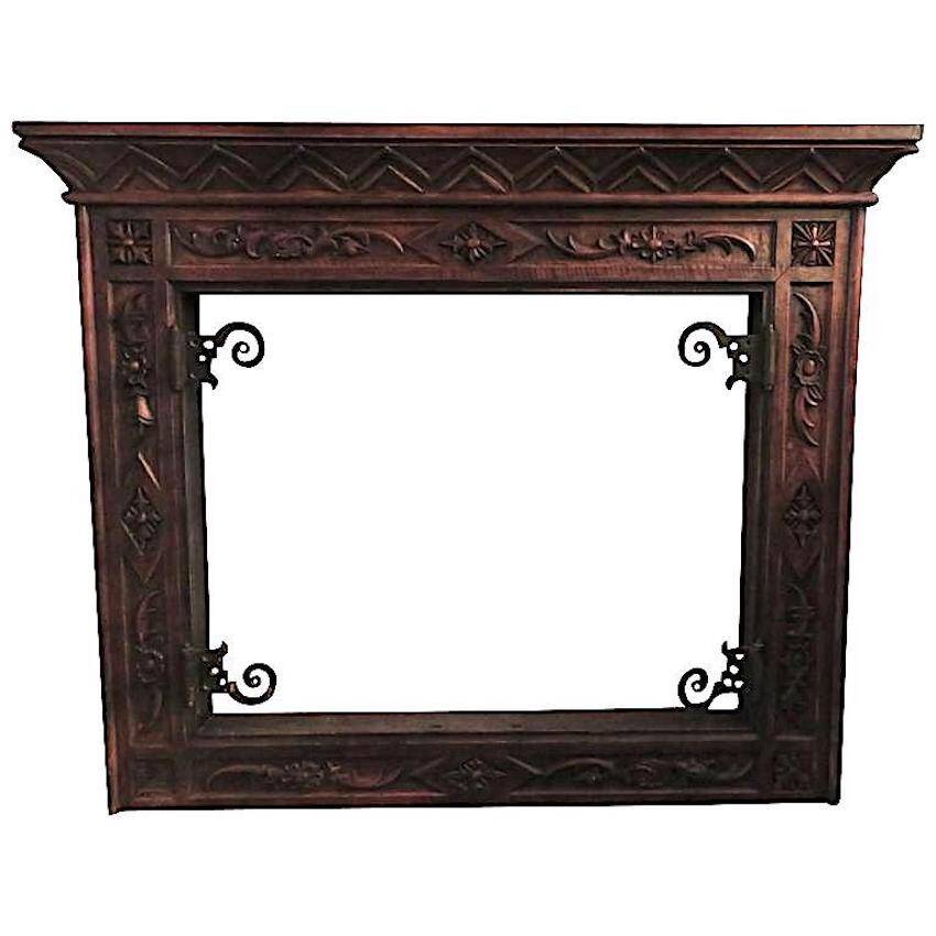 Art deco fireplace in carved solid teak and wrought iron, 1920